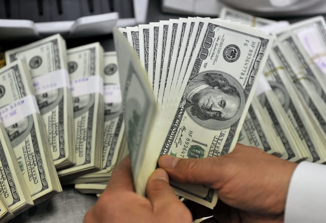 Giá USD tự do ngày 11-3 tiếp tục tăng mạnh lên mức mua vào 25.500 đồng và bán ra 25.700 đồng - Ảnh minh họa: AFP