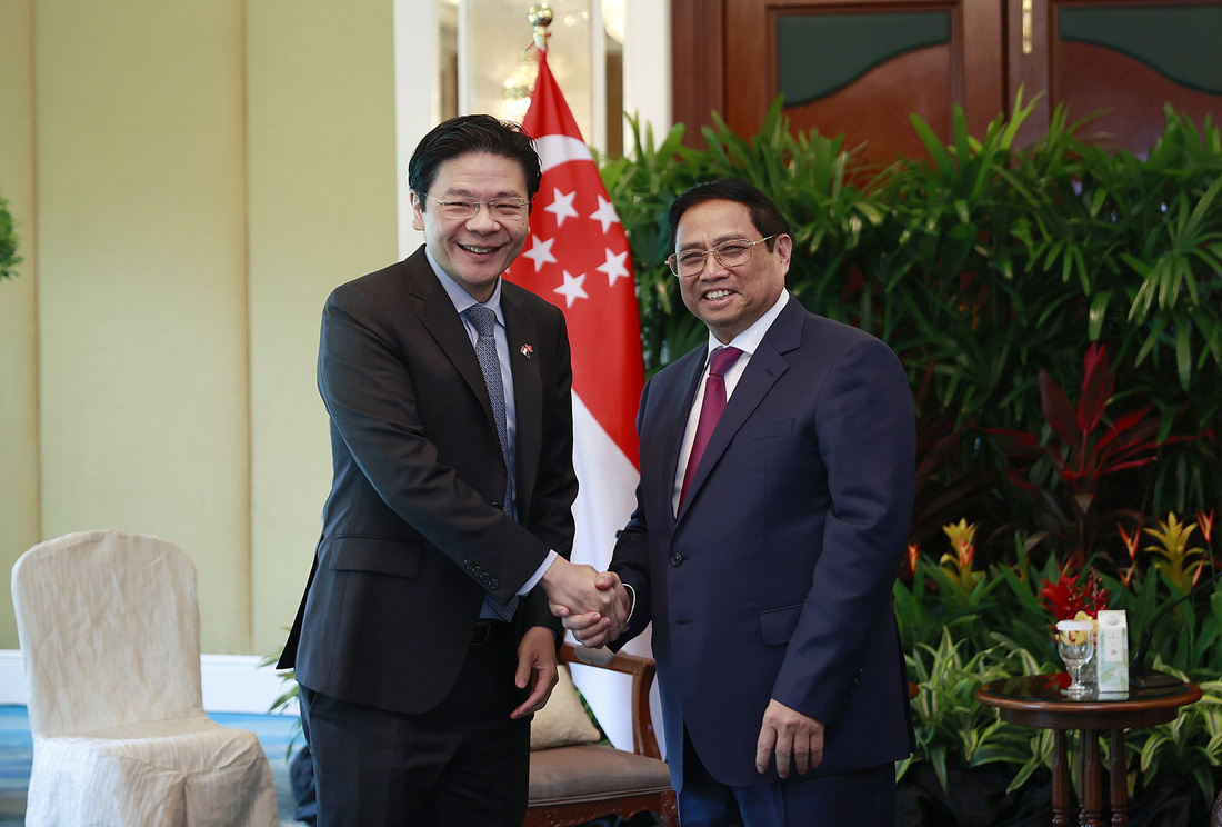 Thủ tướng Việt Nam Phạm Minh Chính gặp ông Hoàng Tuần Tài vào tháng 2-2023 khi ông Hoàng đương là phó thủ tướng Singapore - Ảnh: VGP