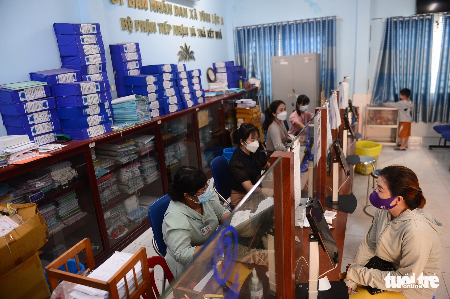 Vì sao công chức TP.HCM bị quá tải? - Ảnh 1.