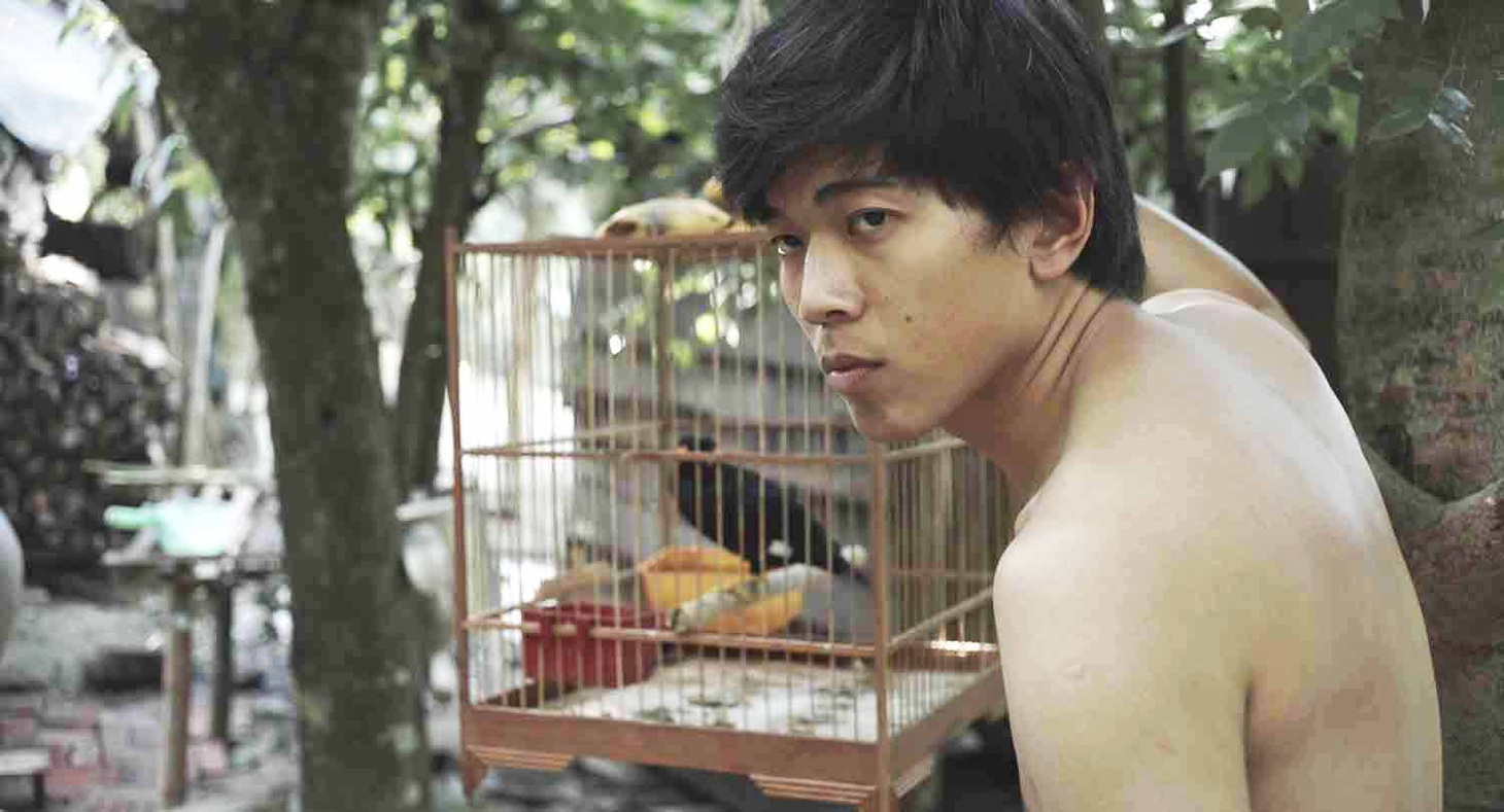 Lê Công Hoàng trong một cảnh phim Tro tàn rực rỡ&nbsp;- Ảnh: ĐPCC