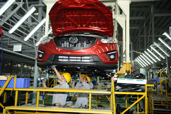 Mazda tăng giá bán trong cơn bão giảm giá xe hơi - Ảnh 2.