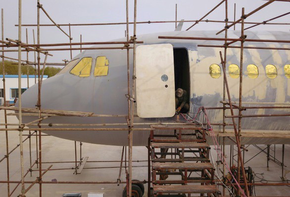 Nông dân trồng tỏi làm được máy bay Airbus như thật - Ảnh 2. Nông dân trồng tỏi làm được máy bay Airbus như thật - Ảnh 2.
