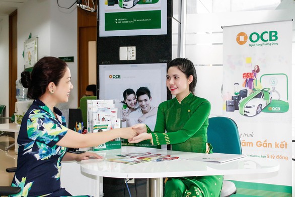 Ngân hàng đua ưu đãi hút tiền gửi dịp cận tết - Ảnh 2. Ngân hàng đua ưu đãi hút tiền gửi dịp cận tết - Ảnh 2.