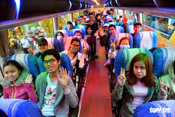 Chuyến xe mùa xuân đưa 3.000 sinh viên về quê đón Tết - Ảnh 9.