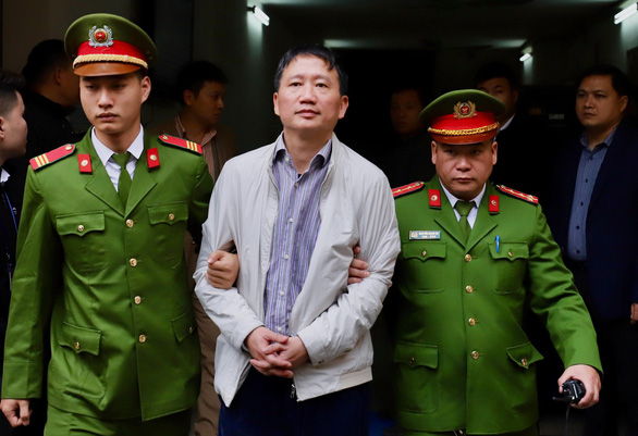 Phạt ông Đinh La Thăng 13 năm tù, ông Trịnh Xuân Thanh tù chung thân - Ảnh 2.