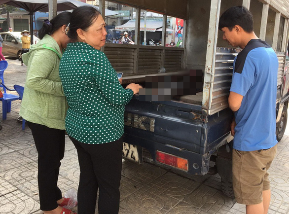 Thêm một gia đình 3 người chết trong vụ cháy chung cư Carina - Ảnh 1. Thêm một gia đình 3 người chết trong vụ cháy chung cư Carina - Ảnh 1.