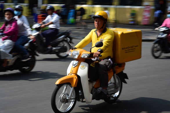 Giao hàng nhanh: Cuộc cạnh tranh khốc liệt - Ảnh 1. Giao hàng nhanh: Cuộc cạnh tranh khốc liệt - Ảnh 1.