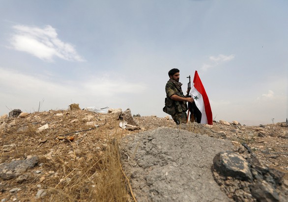 Syria tố hàng loạt căn cứ quân sự bị tên lửa ‘kẻ thù’ tấn công - Ảnh 1. Syria tố hàng loạt căn cứ quân sự bị tên lửa ‘kẻ thù’ tấn công - Ảnh 1.