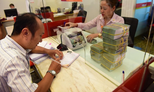 Đề xuất tỉ lệ dùng vốn ngắn hạn cho vay trung dài hạn còn 30% - Ảnh 1. Đề xuất tỉ lệ dùng vốn ngắn hạn cho vay trung dài hạn còn 30% - Ảnh 1.