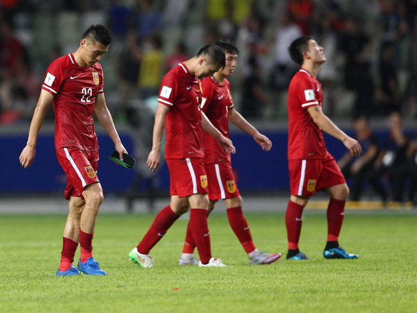 Thiên hạ cứ lo đá World Cup, Trung Quốc lo kiếm tiền - Ảnh 3.