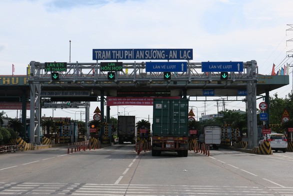 TP.HCM đưa vào hoạt động trạm thu phí tự động đầu tiên - Ảnh 1. TP.HCM đưa vào hoạt động trạm thu phí tự động đầu tiên - Ảnh 1.
