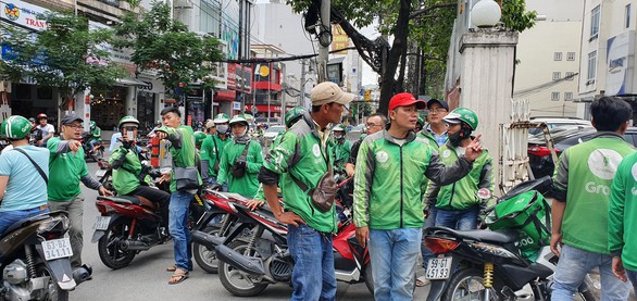 Tăng thu nhập tính thuế cho tài xế công nghệ phải sửa luật - Ảnh 1. Tăng thu nhập tính thuế cho tài xế công nghệ phải sửa luật - Ảnh 1.