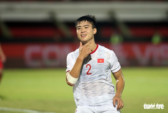 Nụ cười trẻ thơ của Duy Mạnh khi mở tỉ số cho tuyển VN - Ảnh 3. Nụ cười trẻ thơ của Duy Mạnh khi mở tỉ số cho tuyển VN - Ảnh 3.