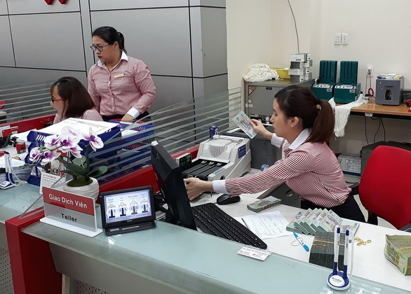Để TP.HCM thành trung tâm tài chính: Lành mạnh hóa hệ thống ngân hàng - Ảnh 1. Để TP.HCM thành trung tâm tài chính: Lành mạnh hóa hệ thống ngân hàng - Ảnh 1.