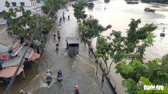 Gió mùa đông bắc gây mưa lớn miền Bắc, triều cường cao ở miền Nam - Ảnh 3. Gió mùa đông bắc gây mưa lớn miền Bắc, triều cường cao ở miền Nam - Ảnh 3.