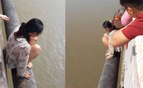 Người mẹ trẻ bỏ lại con trên cầu Chương Dương, định lao xuống sông Hồng - Ảnh 1. Người mẹ trẻ bỏ lại con trên cầu Chương Dương, định lao xuống sông Hồng - Ảnh 1.