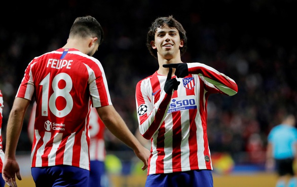 Atletico Madrid đáp ‘tàu muộn’ vào vòng 16 đội Champions League - Ảnh 1. Atletico Madrid đáp ‘tàu muộn’ vào vòng 16 đội Champions League - Ảnh 1.