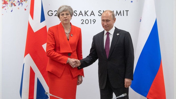 Nhìn lại 20 năm lãnh đạo của ông Putin qua 20 bức ảnh - Ảnh 17. Nhìn lại 20 năm lãnh đạo của ông Putin qua 20 bức ảnh - Ảnh 17.