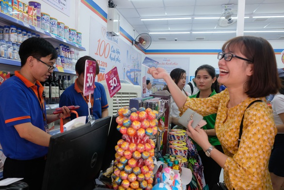 Cột mốc mới của Co.op Smile: 100 cửa hàng trở thành điểm kết nối dân cư - Ảnh 1. Cột mốc mới của Co.op Smile: 100 cửa hàng trở thành điểm kết nối dân cư - Ảnh 1.