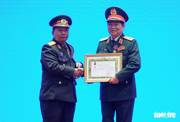 Trao huân chương của Việt Nam, Lào, Campuchia cho các cá nhân, tập thể - Ảnh 3. Trao huân chương của Việt Nam, Lào, Campuchia cho các cá nhân, tập thể - Ảnh 3.