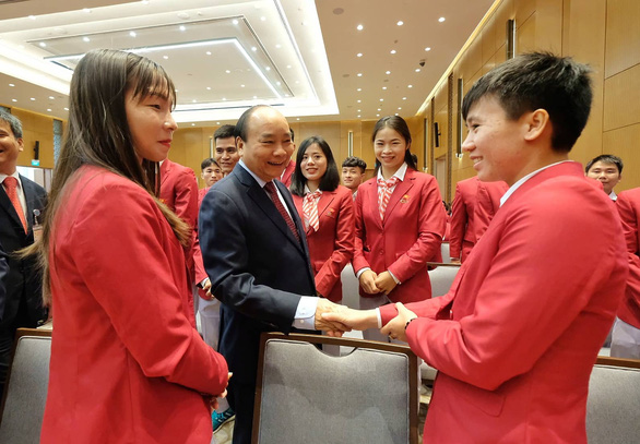 Thành tích của thể thao tạo không khí phấn khởi cho toàn dân tộc - Ảnh 1. Thành tích của thể thao tạo không khí phấn khởi cho toàn dân tộc - Ảnh 1.