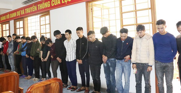Phá đường dây lừa đảo qua điện thoại, bắt 23 người - Ảnh 1. Phá đường dây lừa đảo qua điện thoại, bắt 23 người - Ảnh 1.