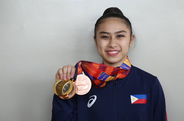 VĐV tuổi teen chiến thắng ung thư giành huy chương vàng SEA Games - Ảnh 1. VĐV tuổi teen chiến thắng ung thư giành huy chương vàng SEA Games - Ảnh 1.