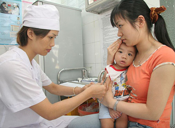 Bộ Y tế khuyến cáo người dân tiêm văcxin cúm mùa - Ảnh 1.