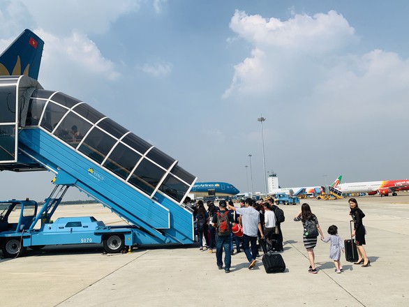 Vietnam Airlines tung ra loại vé không hành lý ký gửi - Ảnh 1. Vietnam Airlines tung ra loại vé không hành lý ký gửi - Ảnh 1.