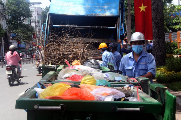 Vẫn băn khoăn cách tính giá thu gom, vận chuyển rác - Ảnh 2. Vẫn băn khoăn cách tính giá thu gom, vận chuyển rác - Ảnh 2.