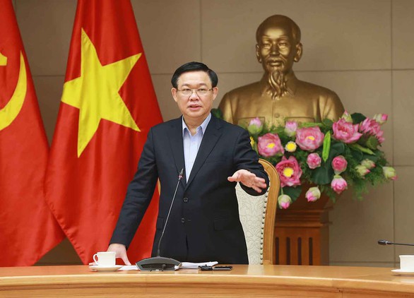 Khối tư nhân một người nhiều việc, khối nhà nước một việc nhiều người - Ảnh 1. Khối tư nhân một người nhiều việc, khối nhà nước một việc nhiều người - Ảnh 1.