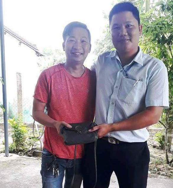Thanh niên nhặt gần 50 triệu đồng trả lại người mất được tặng giấy khen - Ảnh 2. Thanh niên nhặt gần 50 triệu đồng trả lại người mất được tặng giấy khen - Ảnh 2.