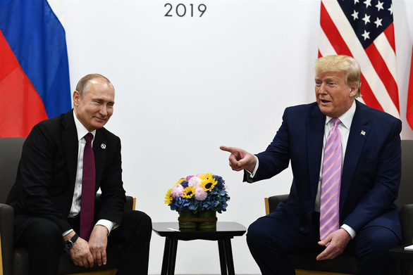Ông Trump nói ‘làm ơn đừng can thiệp bầu cử’, ông Putin bật cười thích thú - Ảnh 2. Ông Trump nói ‘làm ơn đừng can thiệp bầu cử’, ông Putin bật cười thích thú - Ảnh 2.