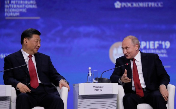 Ủng hộ Bắc Kinh, ông Putin lên án ‘thói ích kỷ kinh tế’ của Mỹ - Ảnh 1. Ủng hộ Bắc Kinh, ông Putin lên án ‘thói ích kỷ kinh tế’ của Mỹ - Ảnh 1.