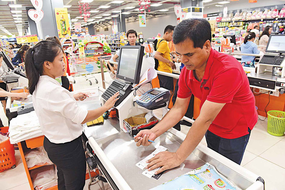 Người nước ngoài và chi tiêu không tiền mặt ở Việt Nam - Ảnh 1. Người nước ngoài và chi tiêu không tiền mặt ở Việt Nam - Ảnh 1.