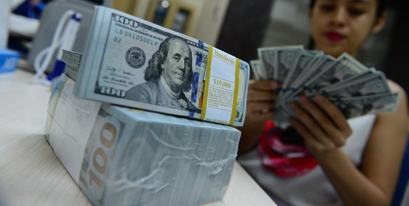 Vàng và USD cùng hạ nhiệt - Ảnh 1. Vàng và USD cùng hạ nhiệt - Ảnh 1.