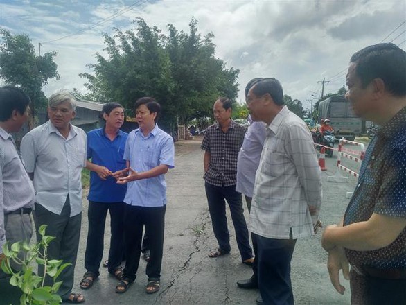 Quốc lộ 91 có nguy cơ rớt xuống sông Hậu - Ảnh 8. Quốc lộ 91 có nguy cơ rớt xuống sông Hậu - Ảnh 8.