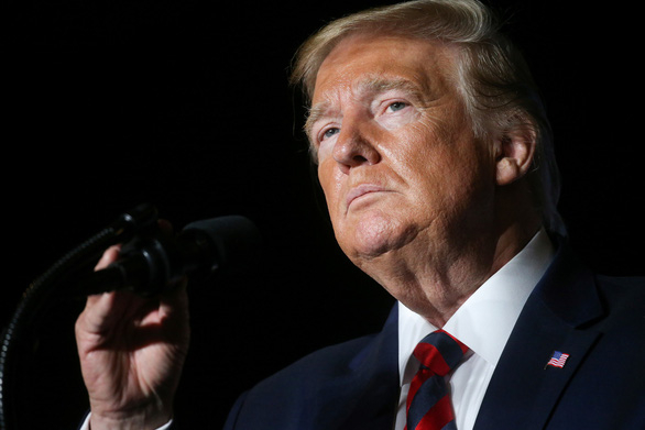 Ông Trump chính thức trở thành tổng thống Mỹ thứ ba bị luận tội - Ảnh 1. Ông Trump chính thức trở thành tổng thống Mỹ thứ ba bị luận tội - Ảnh 1.