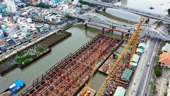 Dự án chống ngập 10.000 tỉ đồng cơ bản xong thủ tục bồi thường hỗ trợ, tái định cư - Ảnh 1. Dự án chống ngập 10.000 tỉ đồng cơ bản xong thủ tục bồi thường hỗ trợ, tái định cư - Ảnh 1.
