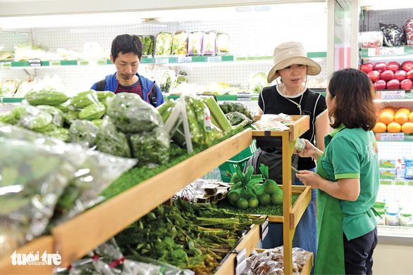 Co.op Food vượt con số 400 cửa hàng: Đưa hàng Việt đến tận ngõ - Ảnh 1.