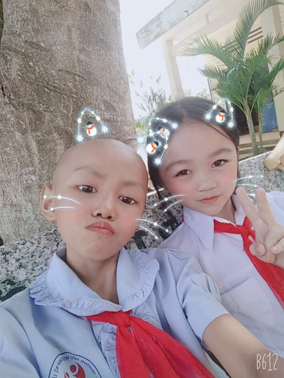 Từ cô bé tóc mây thành chiến binh đầu trọc - Ảnh 2. Từ cô bé tóc mây thành chiến binh đầu trọc - Ảnh 2.
