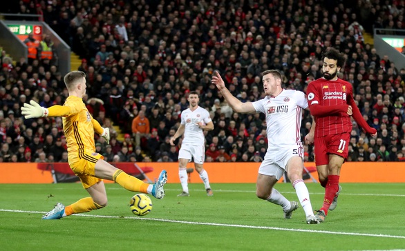 Thắng nhẹ nhàng Sheffield, Liverpool vững chắc ngôi đầu Premier League - Ảnh 1. Thắng nhẹ nhàng Sheffield, Liverpool vững chắc ngôi đầu Premier League - Ảnh 1.