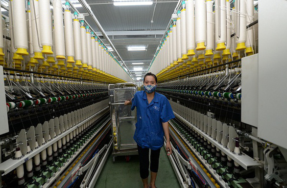 Dệt may Việt Nam mệt mỏi vì vải Trung Quốc quá rẻ - Ảnh 1.