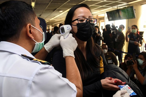 Các nước siết nhập cảnh với Trung Quốc để chống dịch virus corona - Ảnh 1. Các nước siết nhập cảnh với Trung Quốc để chống dịch virus corona - Ảnh 1.