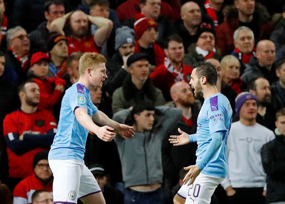 Man City ‘giải quyết gọn Man United ở bán kết lượt đi Cúp liên đoàn - Ảnh 1. Man City ‘giải quyết gọn Man United ở bán kết lượt đi Cúp liên đoàn - Ảnh 1.