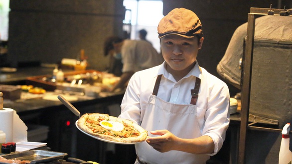 Pizza cơm tấm, bánh xèo taco, kem nước mắm ở Sài Gòn - Ảnh 1. Pizza cơm tấm, bánh xèo taco, kem nước mắm ở Sài Gòn - Ảnh 1.