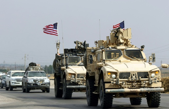 Liên quân ở Iraq: Ai còn ở lại và ai rút đi? - Ảnh 3. Liên quân ở Iraq: Ai còn ở lại và ai rút đi? - Ảnh 3.