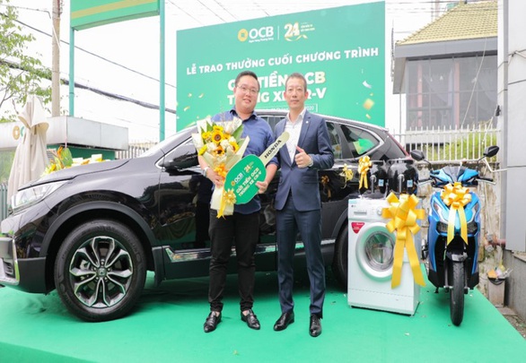 OCB trao thưởng xe Ô tô CRV cho Khách hàng tại Bình Dương - Ảnh 1. OCB trao thưởng xe Ô tô CRV cho Khách hàng tại Bình Dương - Ảnh 1.