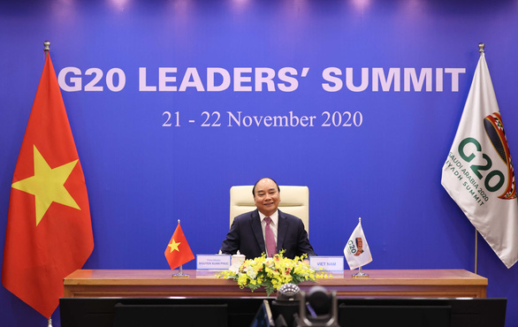 Thủ tướng Nguyễn Xuân Phúc kêu gọi các nước đoàn kết vượt qua COVID-19 tại G20 - Ảnh 1.