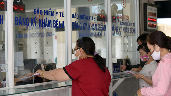 People from other places coming for a medical examination and treatment in Ho Chi Minh City: Who is covered 100% by health insurance?  - Photo 1.